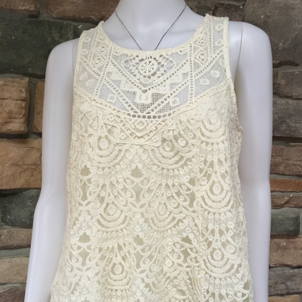 Beautiful cream colored lace sleeveless top